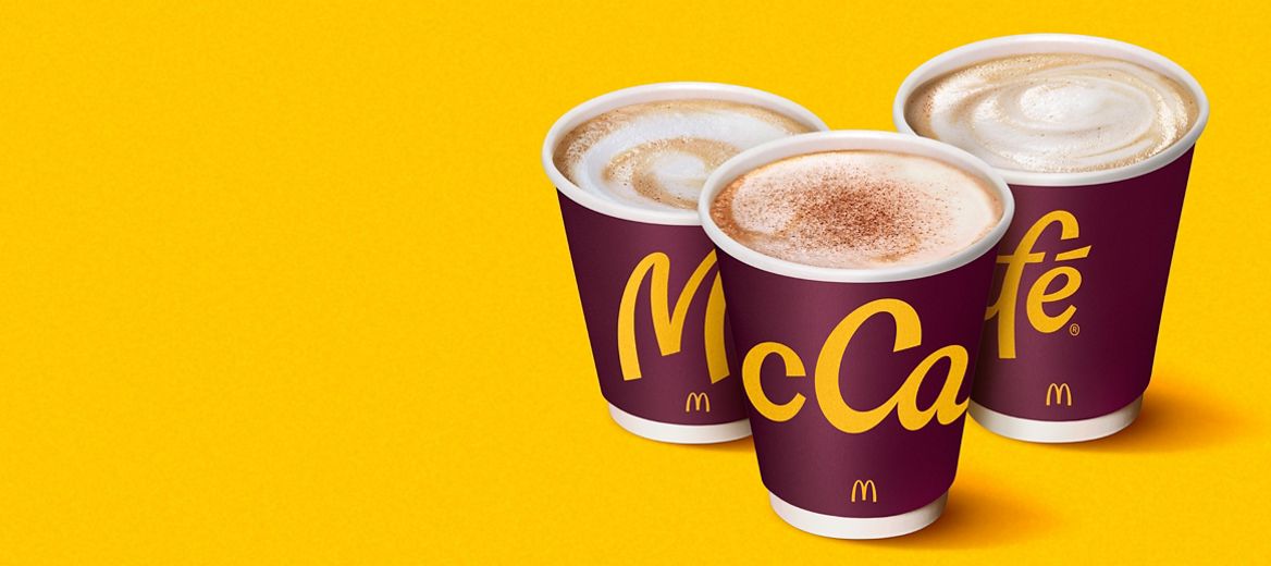 McCafe range of cups on a yellow background
