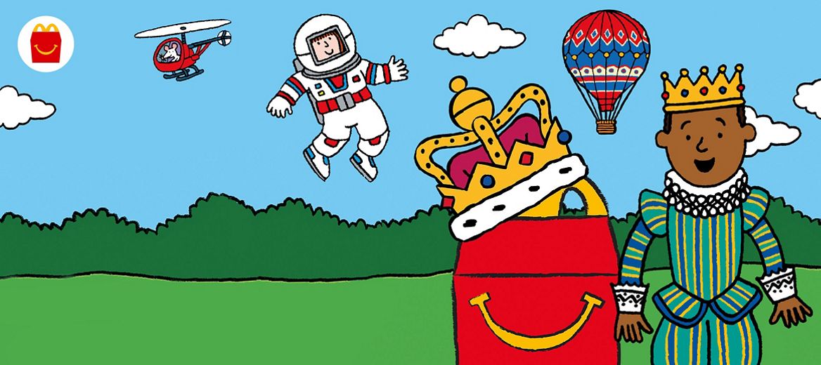 Sky blue background, with green grass and bushes with Happy Meal box with a crown with 2 characters, a helicopter and a hot air balloon 