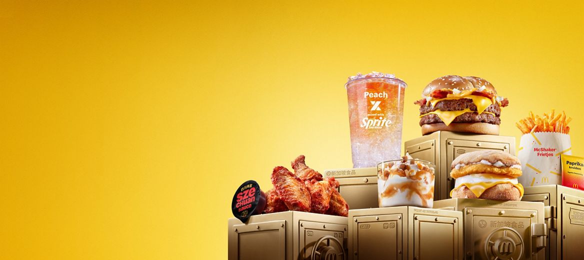 The McDonald's World Menu Heist products all sit on top of gold vaults.
