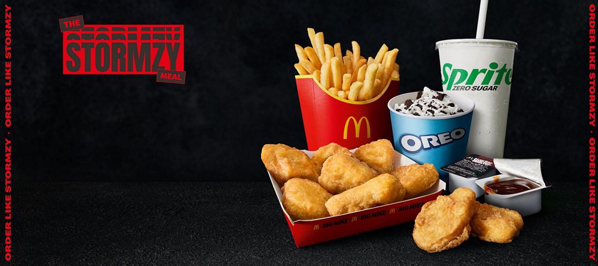 9 Chicken McNuggets, Fries, Sprite Zero and an Apple Pie or Oreo McFlurry on a black background with red copy