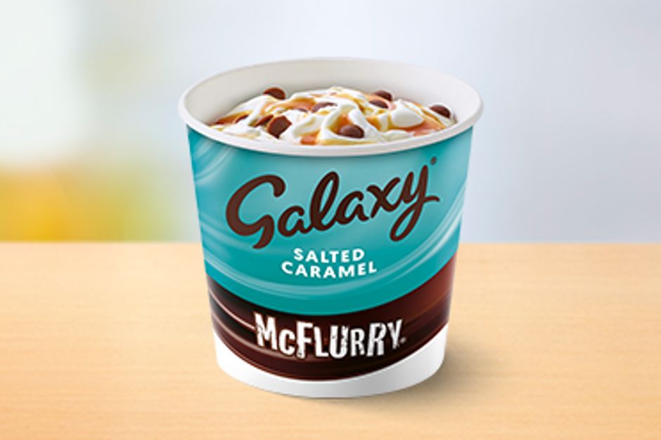 Swirled dairy ice cream drizzled with Galaxy® salted caramel sauce and Galaxy® chocolate pieces.