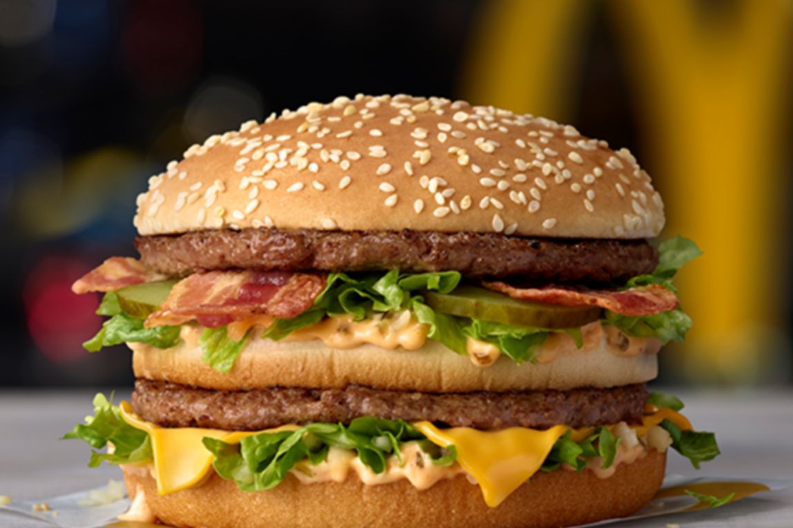 Two 100% beef patties, bacon, a slice of cheese, lettuce, onion, pickles, bacon, and Big Mac™ sauce in a sesame topped bun.