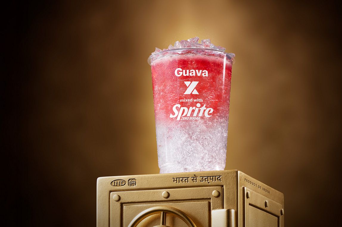 McDonald’s Guava x Sprite® Zero sits on top of a gold vault.
