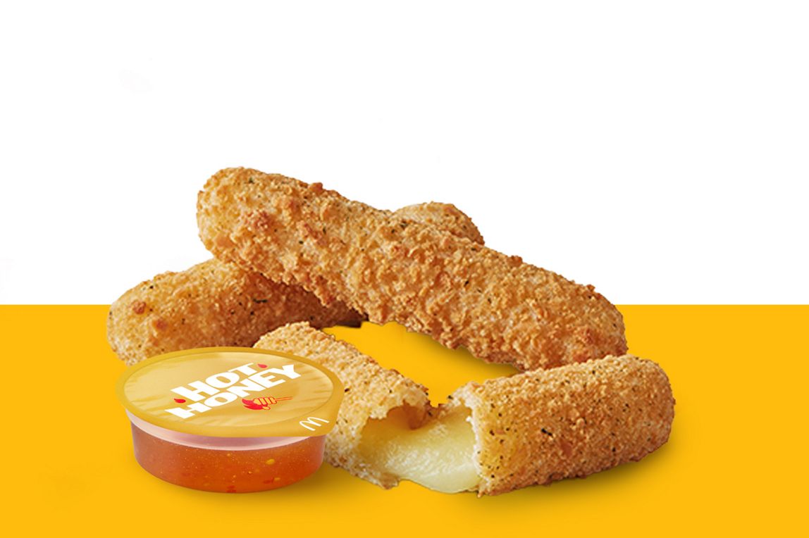 Mozzarella dippers served with a pot of Hot Honey dipping sauce.
