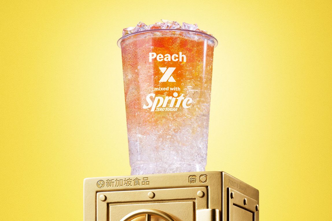 McDonald’s Peach X Sprite® Zero sits on top of a gold vault.