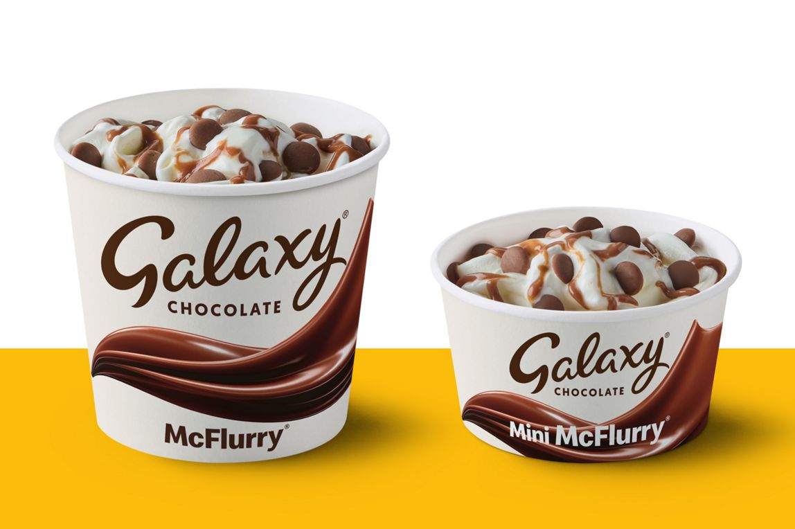 Regular and Mini Galaxy Chocolate McFlurry on a yellow platform and white background
