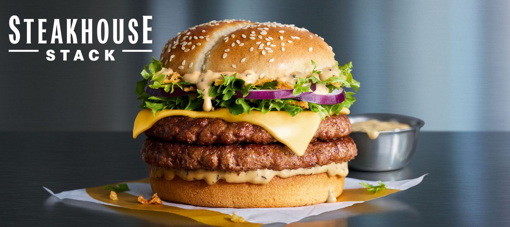 Steakhouse Stack burger on a blue background.