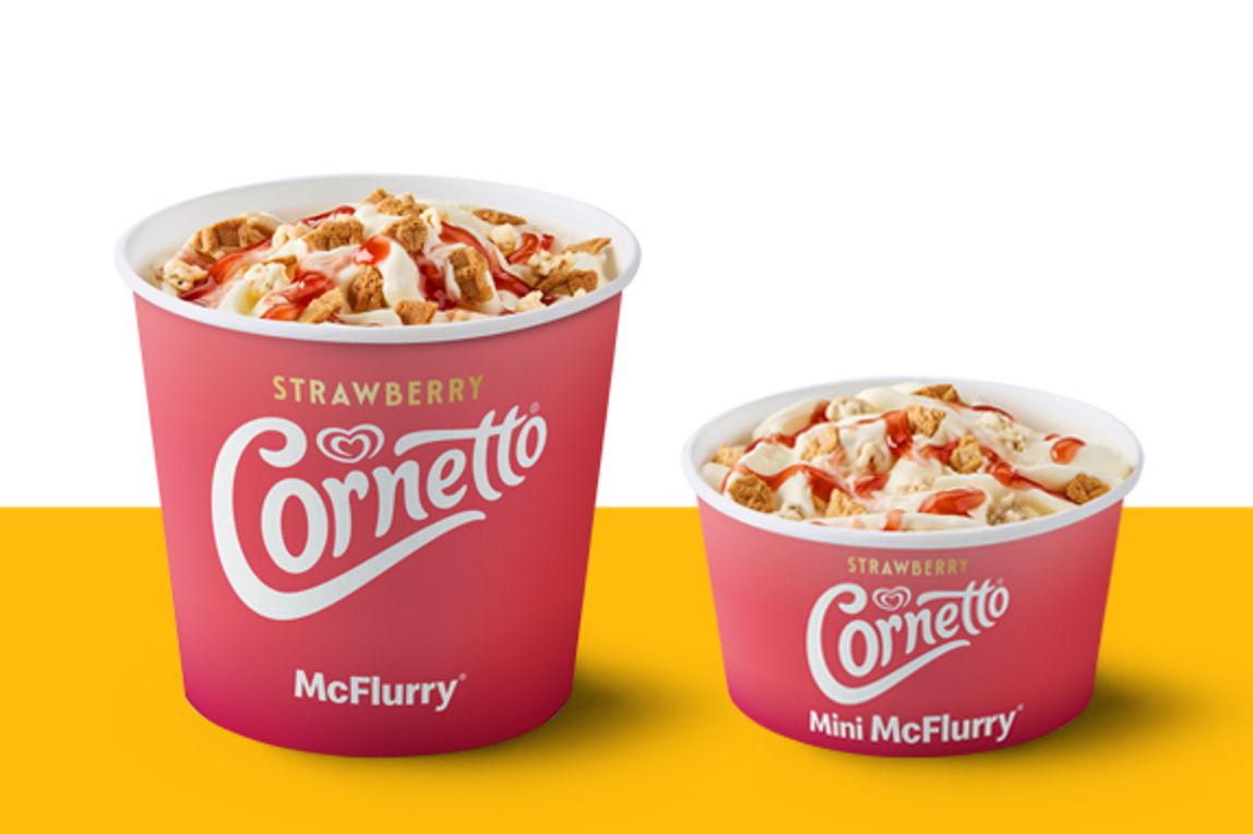Regular and mini Strawberry Cornetto McFlurry desserts topped with biscuit pieces and strawberry sauce.