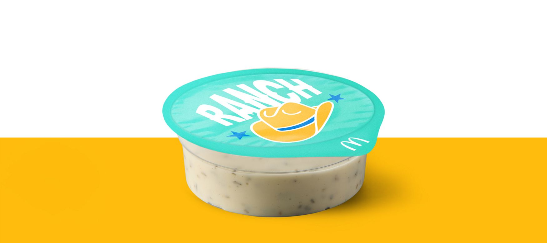 Pot of creamy Ranch dipping sauce with branded turquoise lid.