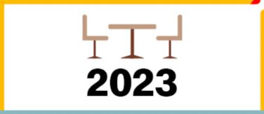 Icon of tables and chairs above the date 2023.
