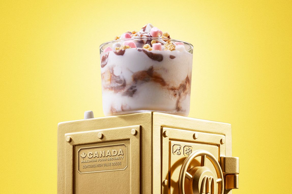 McDonald’s S'mores McFlurry® sits on top of a gold vault.
