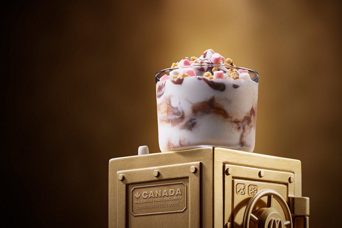 McDonald’s S'mores McFlurry® sits on top of a gold vault.