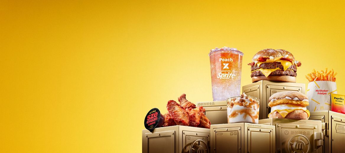 The McDonald's World Menu Heist products all sit on top of gold vaults.