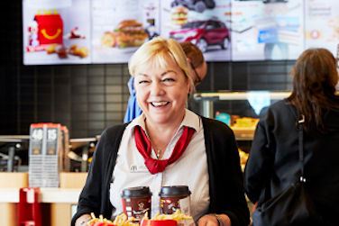 McDonald's staff serving a customer