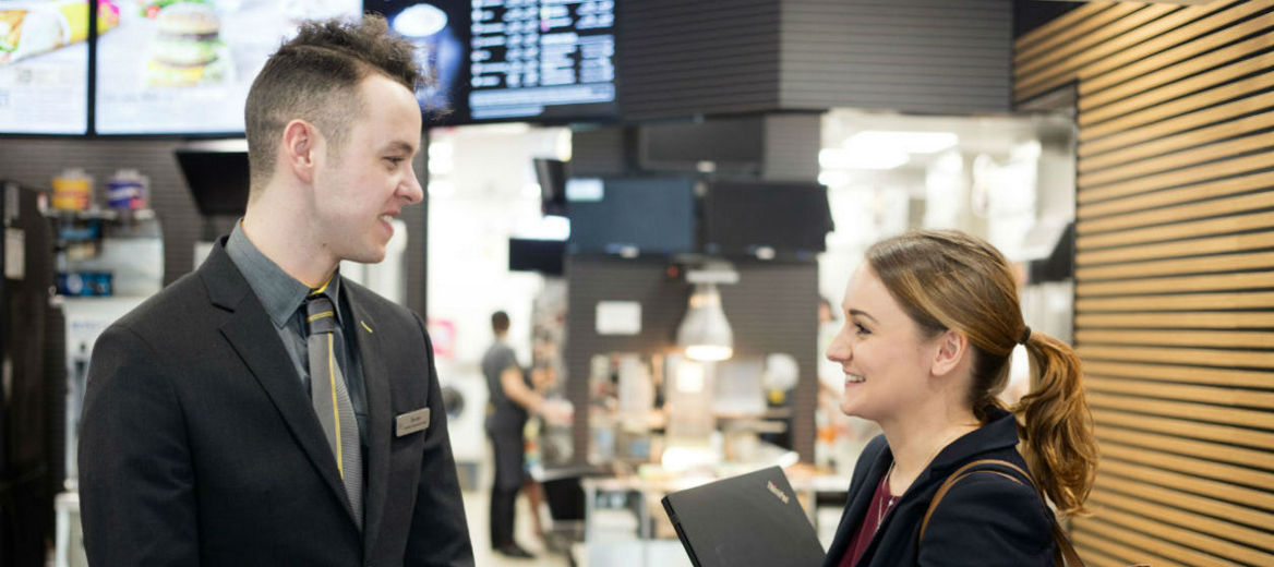 A McDonald’s Manager talking to a customer