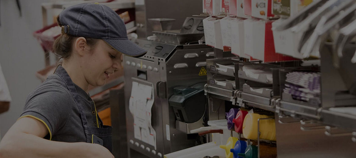 A McDonald’s Crew Member working in the kitchen