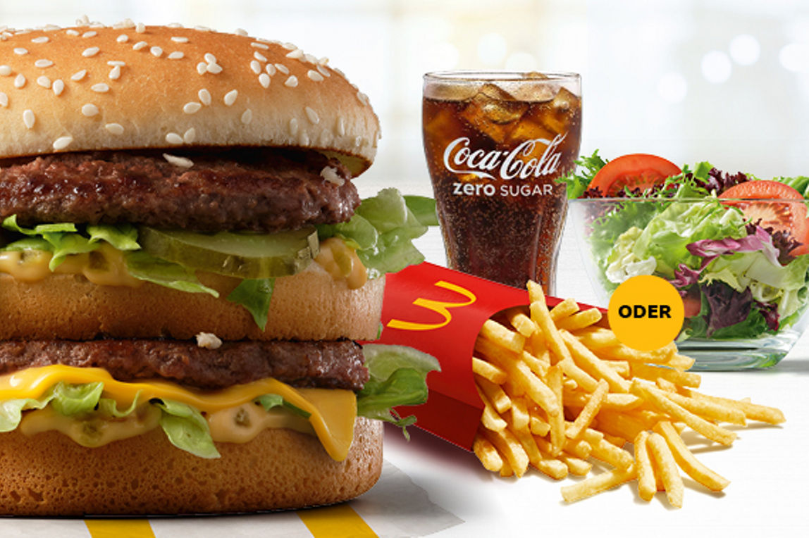 Abbildung des McMenü® mit Big Mac, große Pommes oder Snack Salad, großer Coca-Cola.