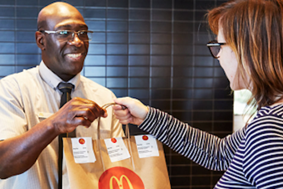 McDonald's staff helping a customer