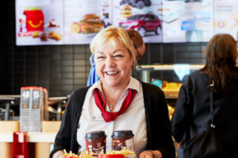 McDonald's staff serving a customer