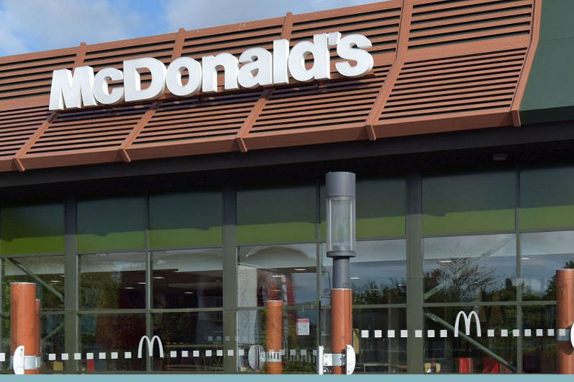 A shot of the exterior of a McDonald's restaurant. 