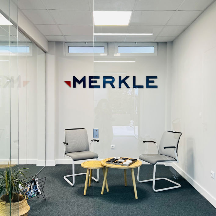 Private office space with two chairs and Merkle logo
