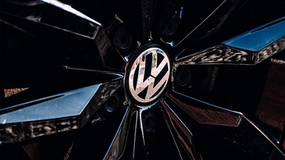 VW car rim that is shiny and sleek