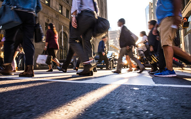 Crosswalk, people crossing in downtown
