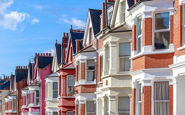 Row of typical English terraced houses in West Hampstead, London