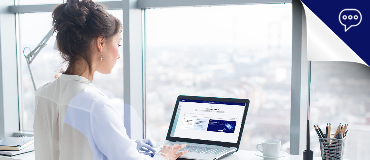 Woman and man pointing at monitor