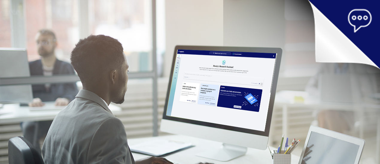 Woman and man pointing at monitor