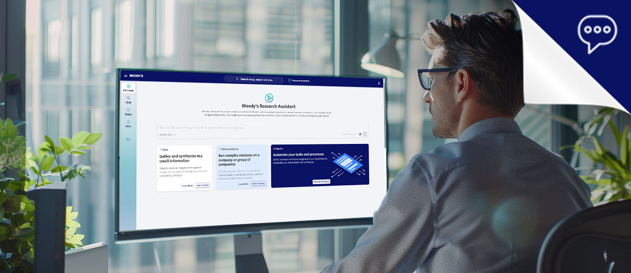 Woman and man pointing at monitor