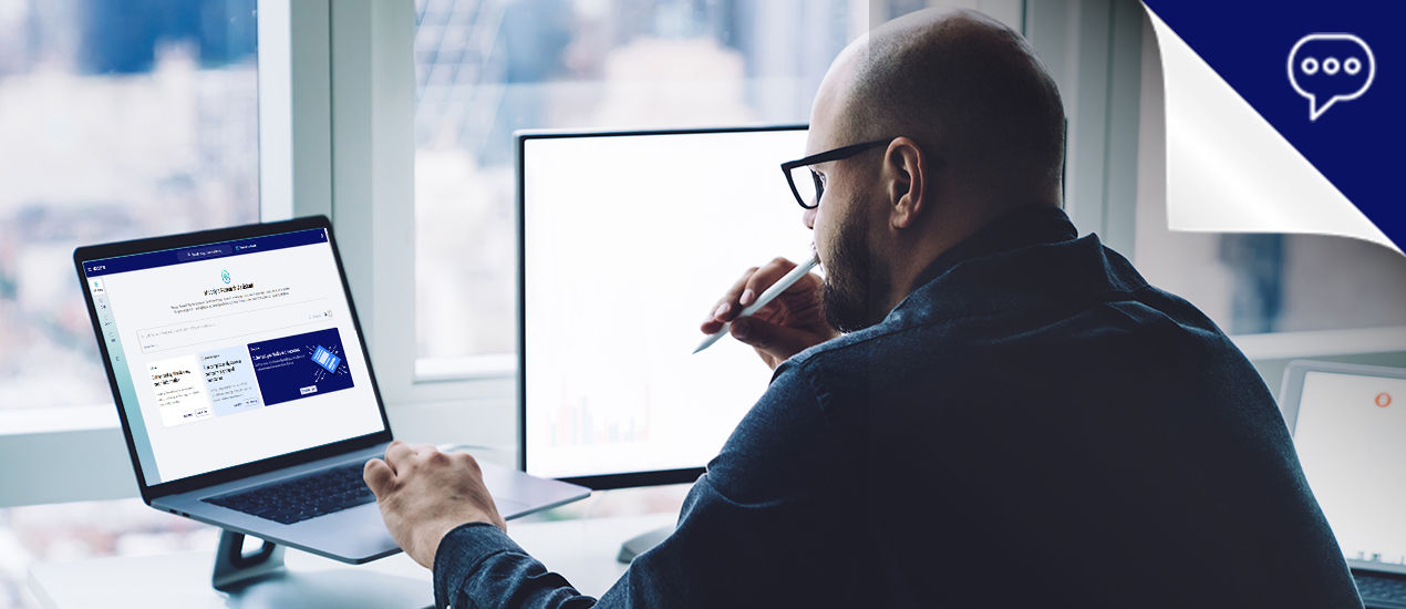 Woman and man pointing at monitor