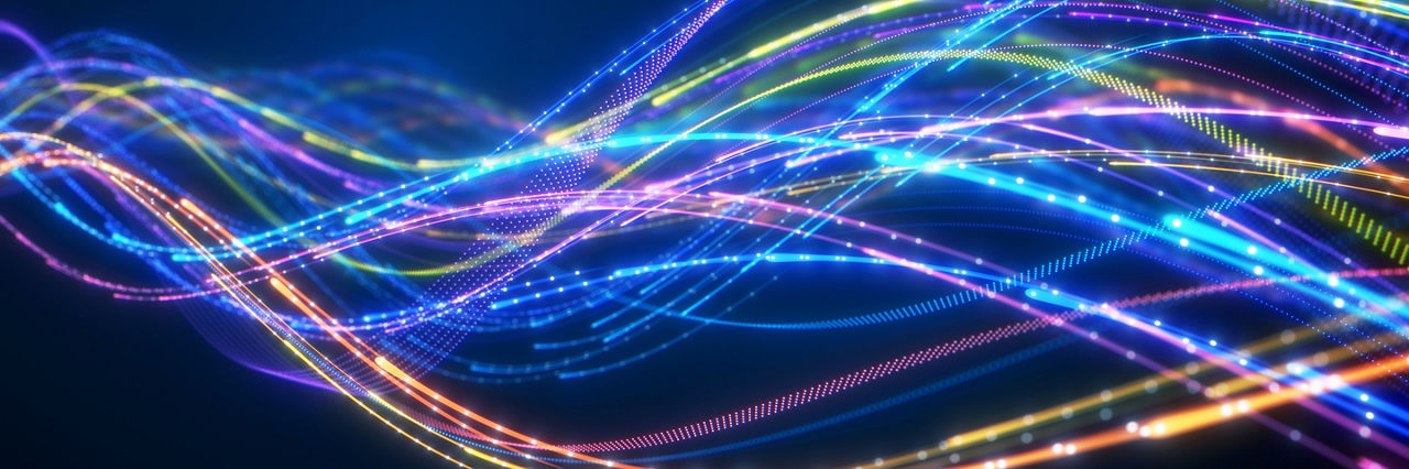 Close up of network data flowing on black background.