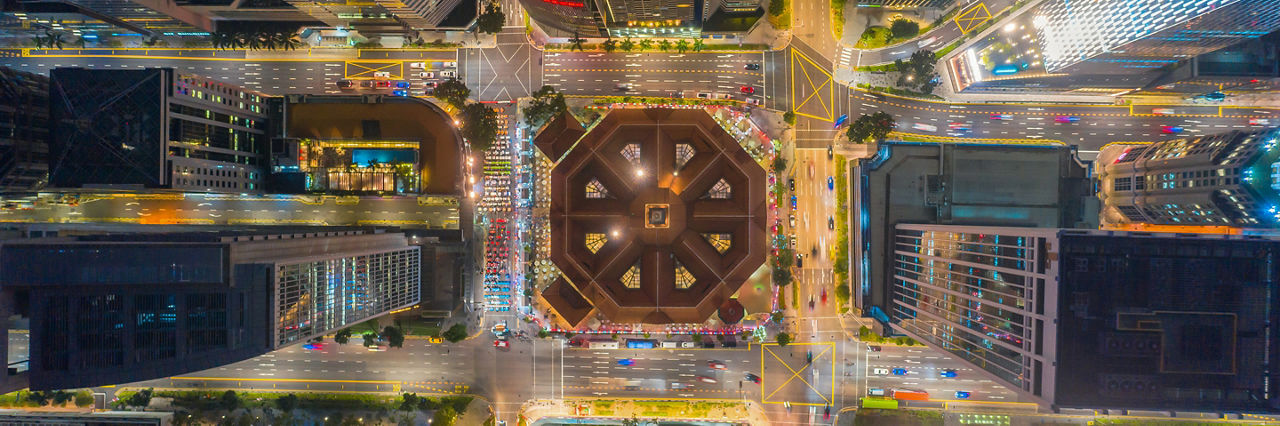 Aerial view Singapore city buildings in business district at night,Financial economy, construction industry,or modern company organization concept