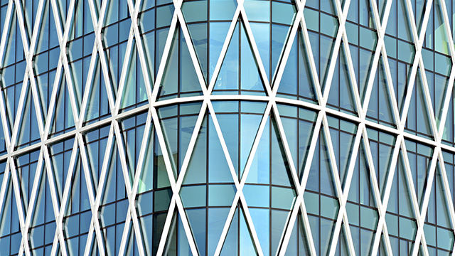 Corporate business glass building and blue sky