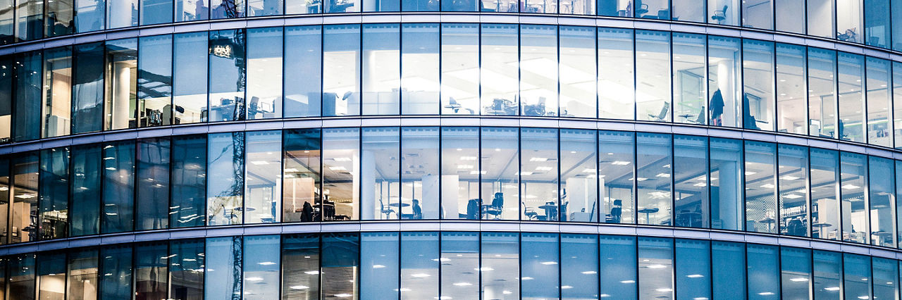 Office buildings in the night in London, UK.