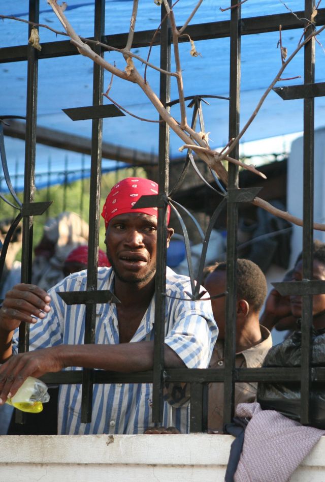 2E2NN6P The Port-au-Prince Police opened a new prison near the Champ-de-Mars refugee camp, in front of the Presidential Palace, in Port-au-Prince, Haiti on February 13, 2010, a month after the devastating earthquake hit the country.The police is searching for the prisoners who escaped when the prison was destroyed by the earthquake. Photo by Axelle De Russe/ABACAPRESS.COM