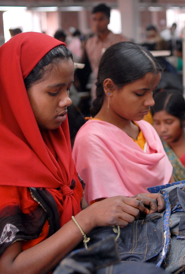 Adolescent girls working in a textile factory