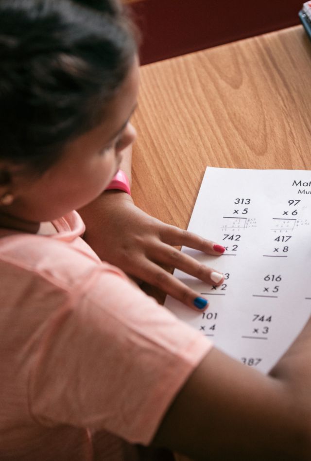 A student completes a multiplication worksheet