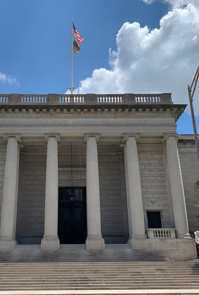 The front of the "Carnegie Institute of Washington" building which features stone columns on the facade