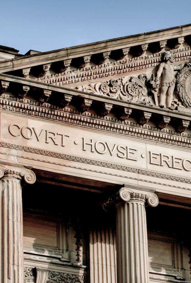 Stock Photo of Courthouse Exterior with Ionic Columns 