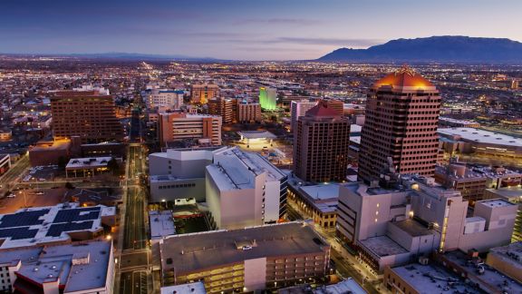 Aerial shot of downtown Albuquerque, New Mexico at sunrise.