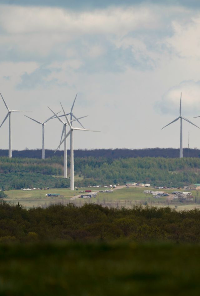 Wind turbine electric power generators are seen from the Flight 93 National Memorial, Saturday, May 8, 2021, in Shanksville, Pa. (AP Photo/Keith Srakocic)