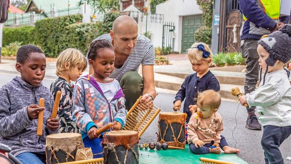 Children playing the drums with parent looking at musical instrument.
Open Streets is a movement created towards behavioural change around the role of streets in the life of the city. The streets are closed to traffic, where people can integrate and socialize.