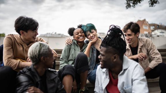 Friends talking in the street