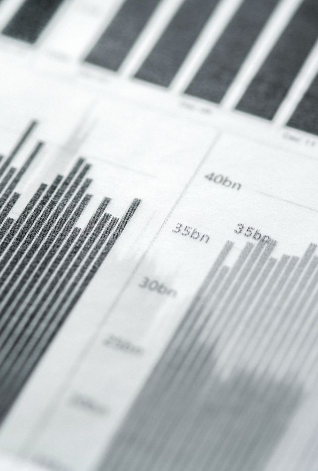 Financial Trading Techniques. Charts analytics printed on tracing paper