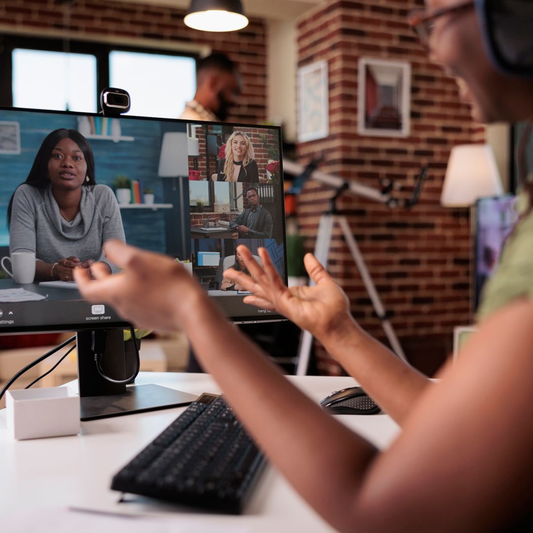 woman taking a video call from home living room