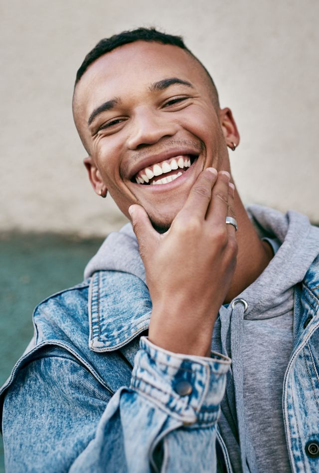 Cropped shot of a handsome young man out in the city