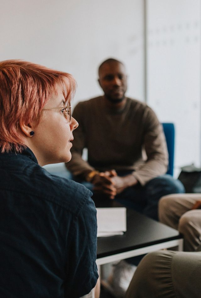 image of diverse group of people in a support group