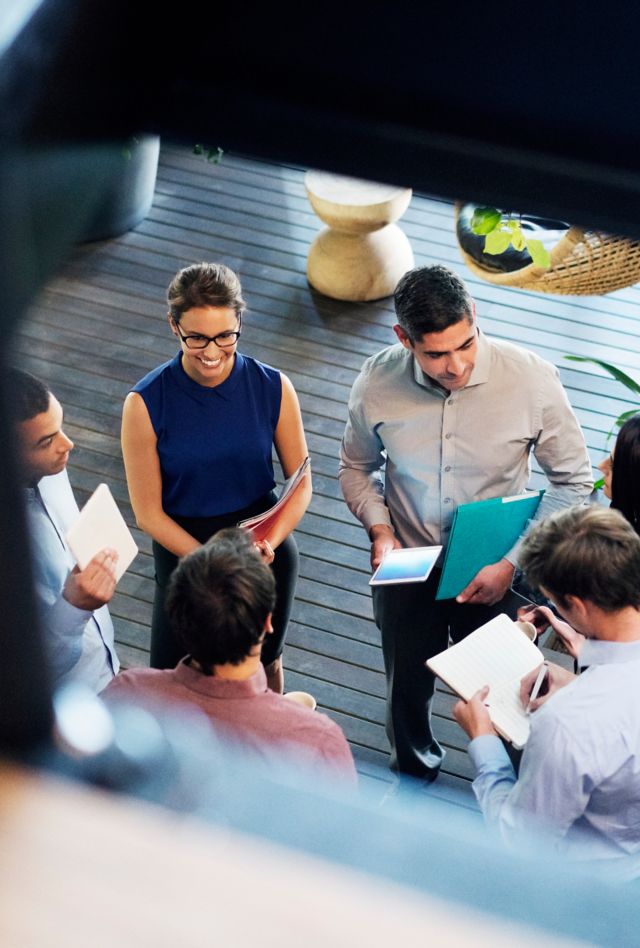 Overhead view of business people talking